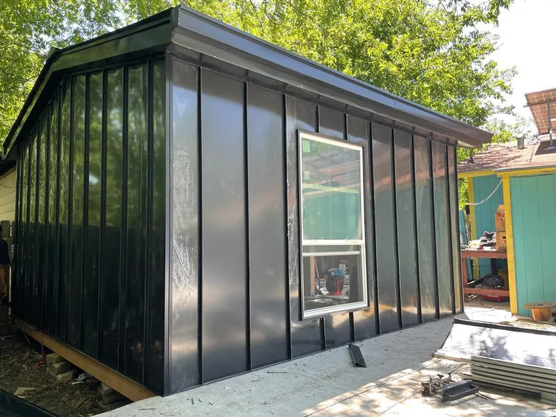 Black standing seam metal wall panels for Roof Inspection in East Moline