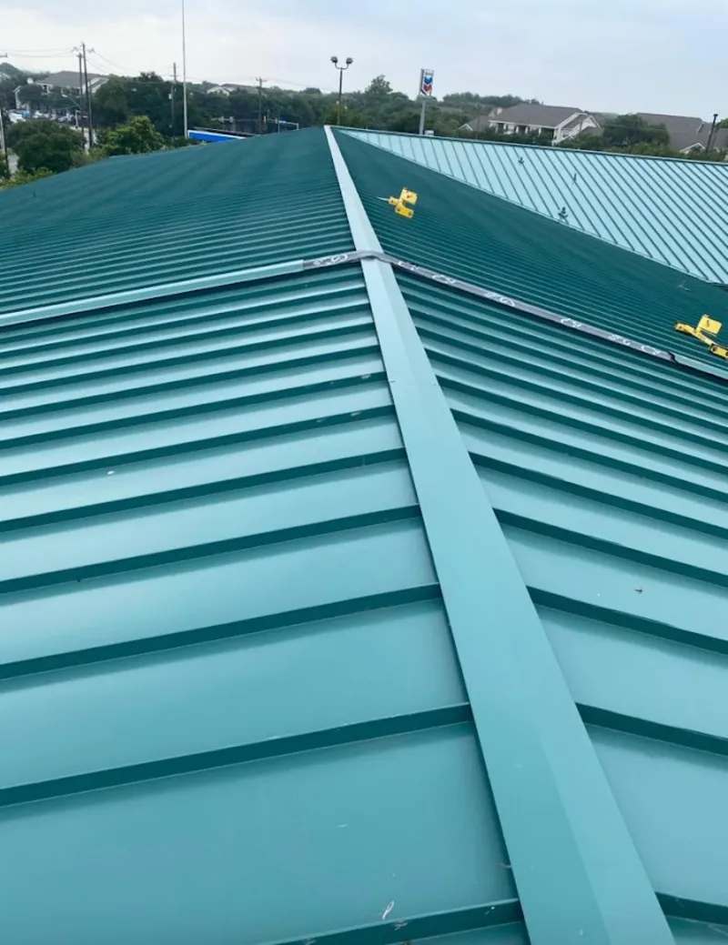 Green commercial metal roof ridge and valley for Metal Roof Repair in East Moline